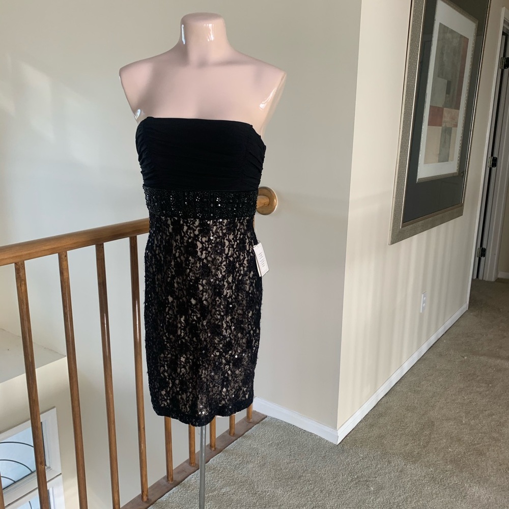 New with tag nude and black lace.